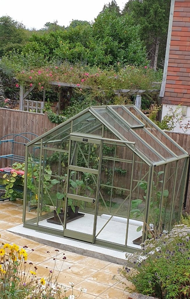 Newly-installed-yellow-patio-paving-in-sunny-garden-6
