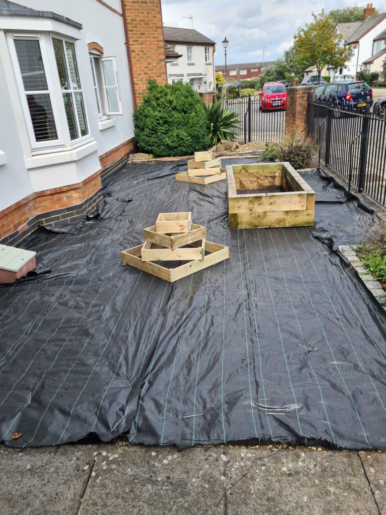 garden-bed-preparation-with-weed-control-fabric