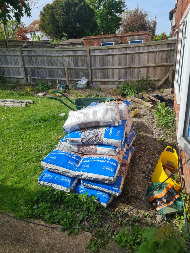 garden-soil-and-compost-bags-before-landscaping