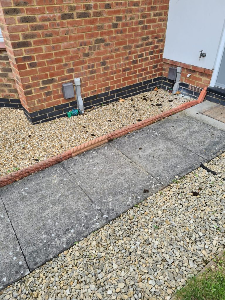 gravel-border-alongside-paved-walkway