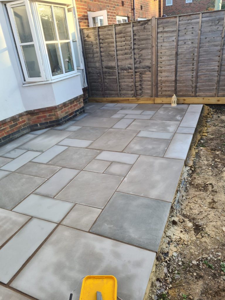 patio-paving-near-back-of-house-with-newly-laid-slabs